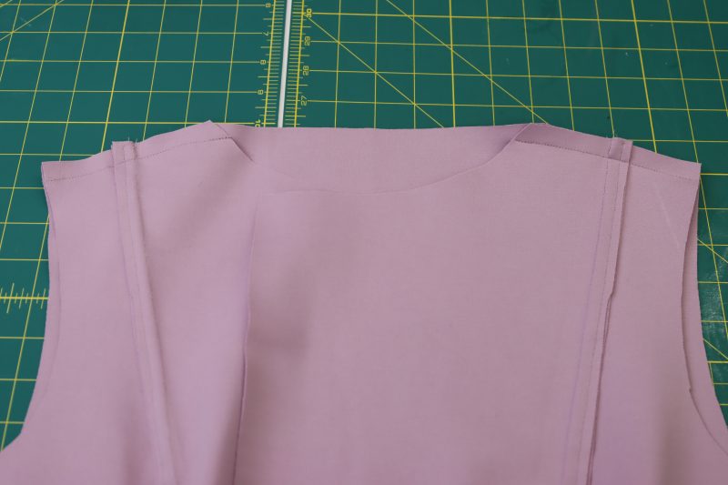 How To Place Front Back Pieces Together - Stretch Ponte Knit - Mood Fabrics - Camarillo Cardigan and Magdalene Midi Skirt Free Sewing Pattern Tutorial - MDF490 - Mood Fabrics Sewciety Blog - Place the front and back cardigan pieces right sides together with the shoulders lined up.