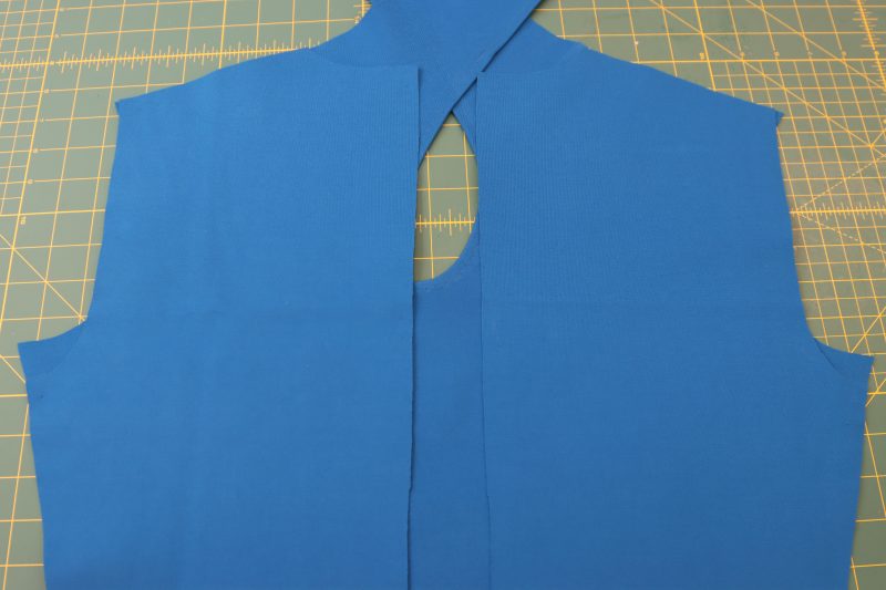 How To Place Back Pieces On Front Piece - Stretch Ponte Knit - Mood Fabrics - Topeka Keyhole Dress Free Sewing Pattern Tutorial - MDF496 - Mood Fabrics Sewciety Blog - Place the back pieces on top of the front piece with the shoulders lined up.