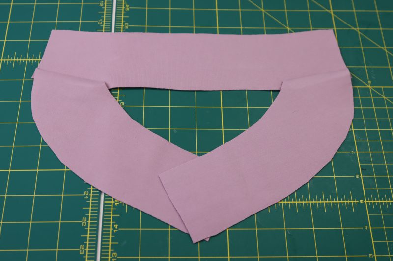 How To Open Neckline Facing - Stretch Ponte Knit - Mood Fabrics - Camarillo Cardigan and Magdalene Midi Skirt Free Sewing Pattern Tutorial - MDF490 - Mood Fabrics Sewciety Blog - Open the neckline facing seams and lay the facing flat.