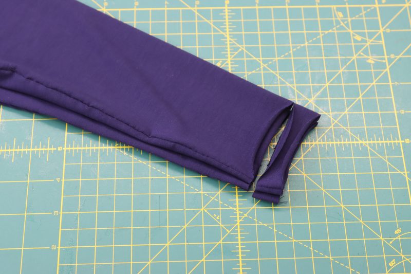 How To Trim Sleeve Ends - Stretch Bamboo Jersey - Mood Fabrics - Altena Blouse Free Sewing Pattern Tutorial - MDF491 - Mood Fabrics Sewciety Blog - Trim the ends of the sleeve of the lining shirt.