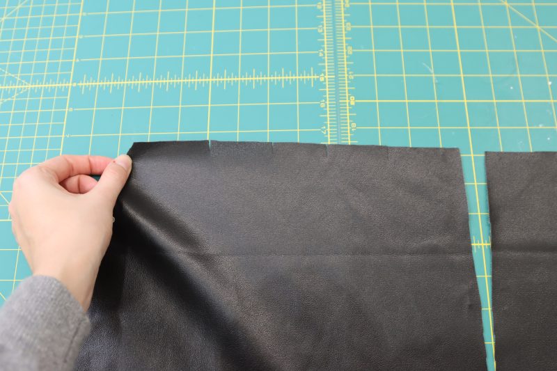 How To Cut Notches For Pleats - Buttery Faux Leather - Mood Fabrics - Dresden Shorts Free Sewing Pattern Tutorial - MDF493 - Mood Fabrics Sewciety Blog - Cut notches into the shorts fronts.