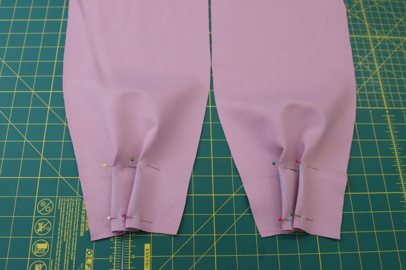 How To Pin Sew Sleeve Darts - Stretch Ponte Knit - Mood Fabrics - Camarillo Cardigan and Magdalene Midi Skirt Free Sewing Pattern Tutorial - MDF490 - Mood Fabrics Sewciety Blog - Pin and sew the sleeve darts.