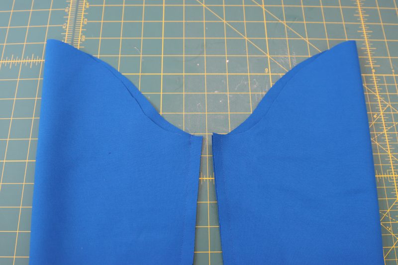 How To Pin Sew Sleeve Inseams - Stretch Ponte Knit - Mood Fabrics - Topeka Keyhole Dress Free Sewing Pattern Tutorial - MDF496 - Mood Fabrics Sewciety Blog - Pin and sew the sleeve inseams.