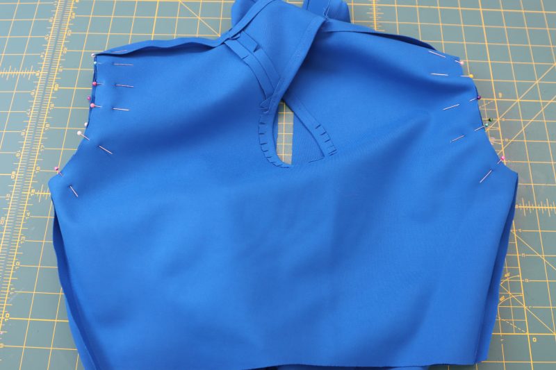 How To Pin Sleeves To Armscyes - Stretch Ponte Knit - Mood Fabrics - Topeka Keyhole Dress Free Sewing Pattern Tutorial - MDF496 - Mood Fabrics Sewciety Blog - Pin the sleeves into the armscyes.