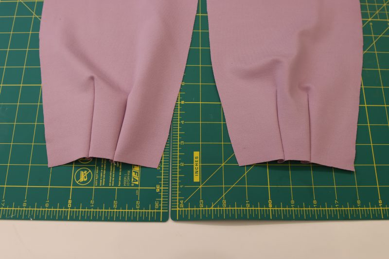 How To Press Sleeve Darts - Stretch Ponte Knit - Mood Fabrics - Camarillo Cardigan and Magdalene Midi Skirt Free Sewing Pattern Tutorial - MDF490 - Mood Fabrics Sewciety Blog - Press the sleeve darts.
