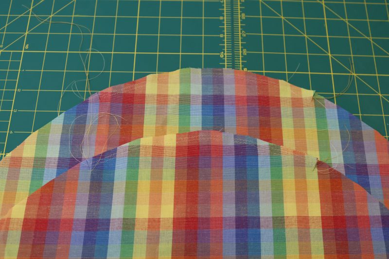 How To Sew Gathering Stitches On Sleeve Caps - Gutermann Sew All Thread - Mood Fabrics - Bayport Blouse Free Sewing Pattern Tutorial - MDF494 - Mood Fabrics Sewciety Blog - Sew the gathering stitches on the sleeves between the notches.