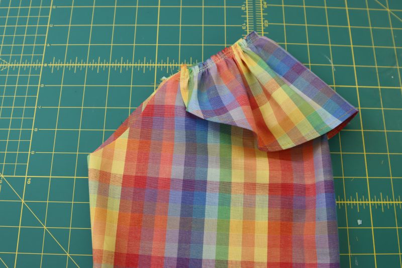 How To Sew Shoulder Ruffle To Sleeve Cap - Rainbow Checks Cotton Shirting - Mood Fabrics - Bayport Blouse Free Sewing Pattern Tutorial - MDF494 - Mood Fabrics Sewciety Blog - Sew the shoulder ruffle to the sleeve cap.