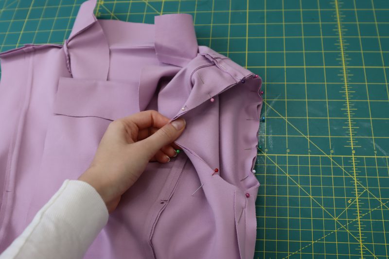 How To Pin Sleeves To Armscyes - Stretch Ponte Knit - Mood Fabrics - Camarillo Cardigan and Magdalene Midi Skirt Free Sewing Pattern Tutorial - MDF490 - Mood Fabrics Sewciety Blog - Pin the sleeves into the armscyes.