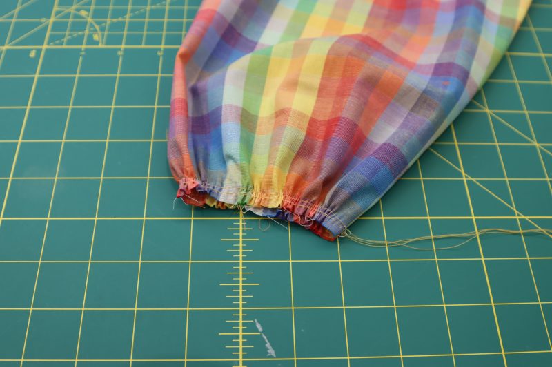 How To Gather Sleeve Openings - Gutermann Sew All Thread - Mood Fabrics - Bayport Blouse Free Sewing Pattern Tutorial - MDF494 - Mood Fabrics Sewciety Blog - Gather the sleeves to fit in the cuffs.