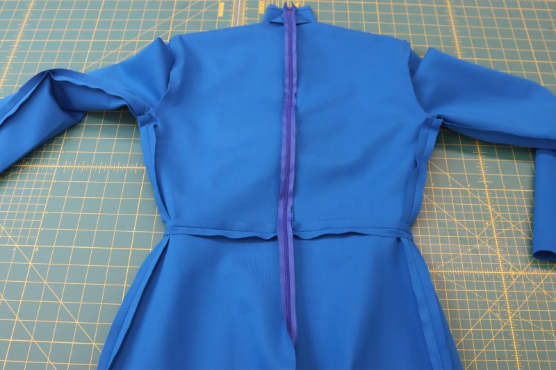 How To Insert Invisible Zipper At Center Back - Invisible Zipper - Mood Fabrics - Topeka Keyhole Dress Free Sewing Pattern Tutorial - MDF496 - Mood Fabrics Sewciety Blog - Insert an invisible zipper into the back of the dress.