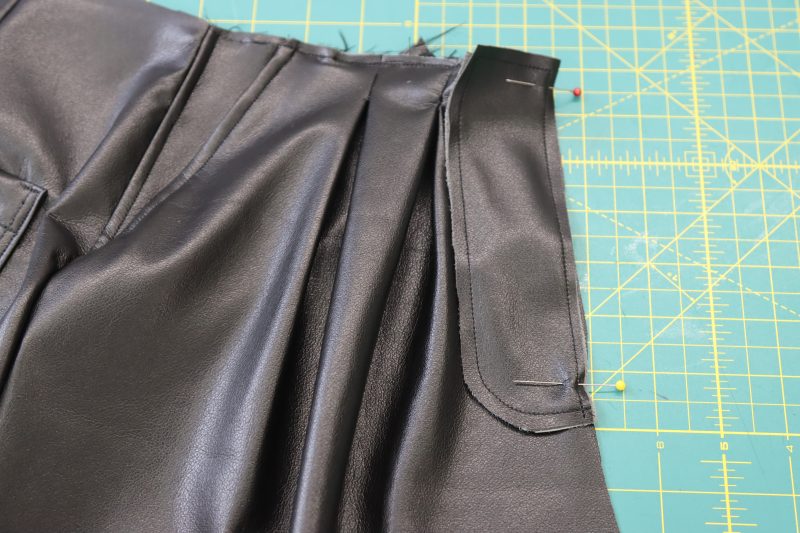 How To Pin Sew Fly Facing - Buttery Faux Leather - Mood Fabrics - Dresden Shorts Free Sewing Pattern Tutorial - MDF493 - Mood Fabrics Sewciety Blog - Pin and sew the fly facing to the center front of the shorts.
