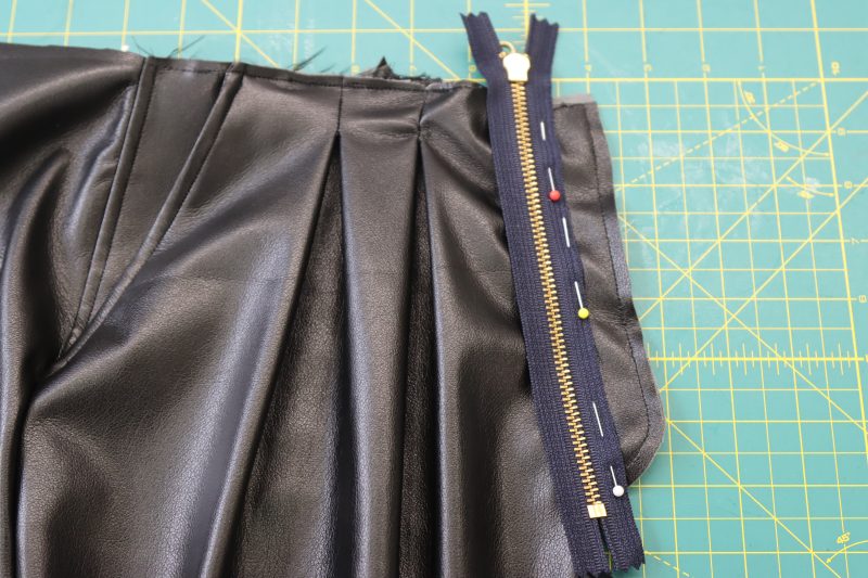 How To Pin Zipper To Fly Facing - Metal Zipper - Mood Fabrics - Dresden Shorts Free Sewing Pattern Tutorial - MDF493 - Mood Fabrics Sewciety Blog - Pin the zipper to the fly facing.