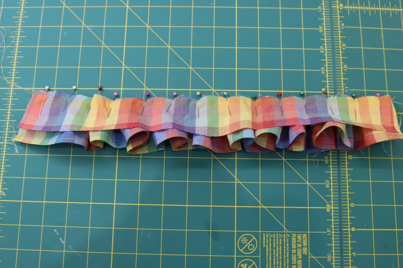 How To Sandwich Bottom Ruffle Between Collars - Rainbow Checks Cotton Shirting - Mood Fabrics - Bayport Blouse Free Sewing Pattern Tutorial - MDF494 - Mood Fabrics Sewciety Blog - Sandwich the bottom collar ruffle between the collar pieces.