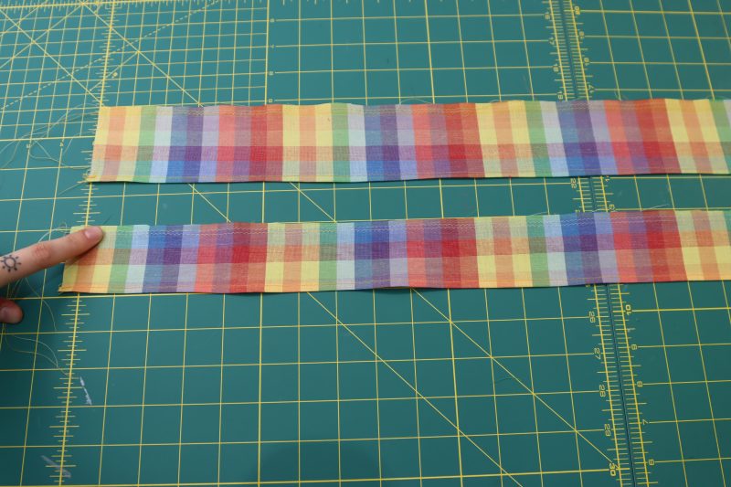 How To Sew Gathering Stitches Along Collar Ruffles - Gutermann Sew All Thread - Mood Fabrics - Bayport Blouse Free Sewing Pattern Tutorial - MDF494 - Mood Fabrics Sewciety Blog - Sew gathering stitches along the raw edges of the collar ruffles.