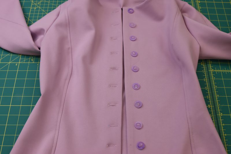 How To Sew All Buttons - Lilac Swirl Buttons - Mood Fabrics - Camarillo Cardigan and Magdalene Midi Skirt Free Sewing Pattern Tutorial - MDF490 - Mood Fabrics Sewciety Blog - Sew all 10 buttons to the front of the cardigan opposite to the button holes.