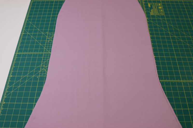 How To Layout Front Back Skirt Pieces - Stretch Ponte Knit - Mood Fabrics - Camarillo Cardigan and Magdalene Midi Skirt Free Sewing Pattern Tutorial - MDF490 - Mood Fabrics Sewciety Blog - Lay the front skirt piece on top of the back skirt piece, right sides together.