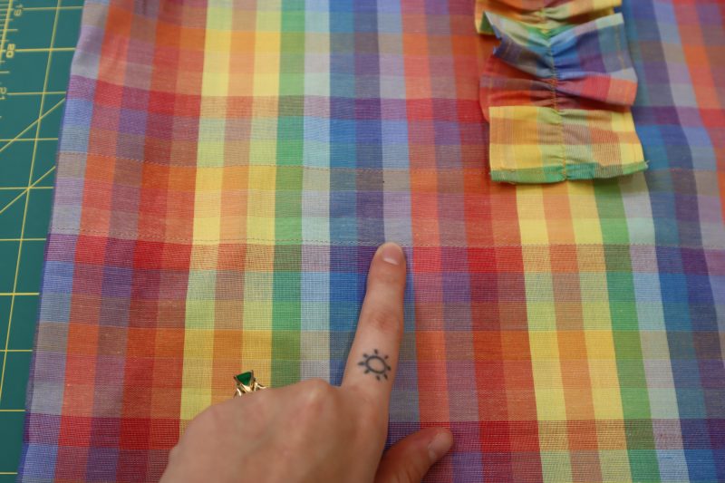How To Sew Elastic Casing To Blouse Waistline - Rainbow Checks Cotton Shirting - Mood Fabrics - Bayport Blouse Free Sewing Pattern Tutorial - MDF494 - Mood Fabrics Sewciety Blog - Sew the top and bottom of the elastic casing to create a tunnel.