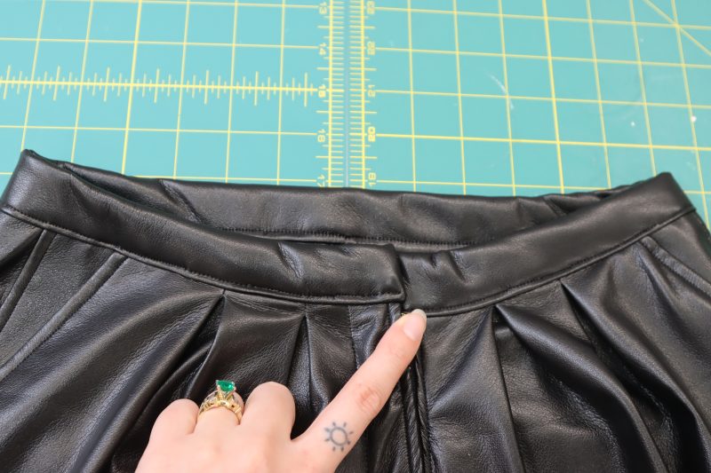 How To Sew Waistband To Waistline - Buttery Faux Leather - Mood Fabrics - Dresden Shorts Free Sewing Pattern Tutorial - MDF493 - Mood Fabrics Sewciety Blog - Sew the waistband to the waistline with ⅛ inch seam allowance.
