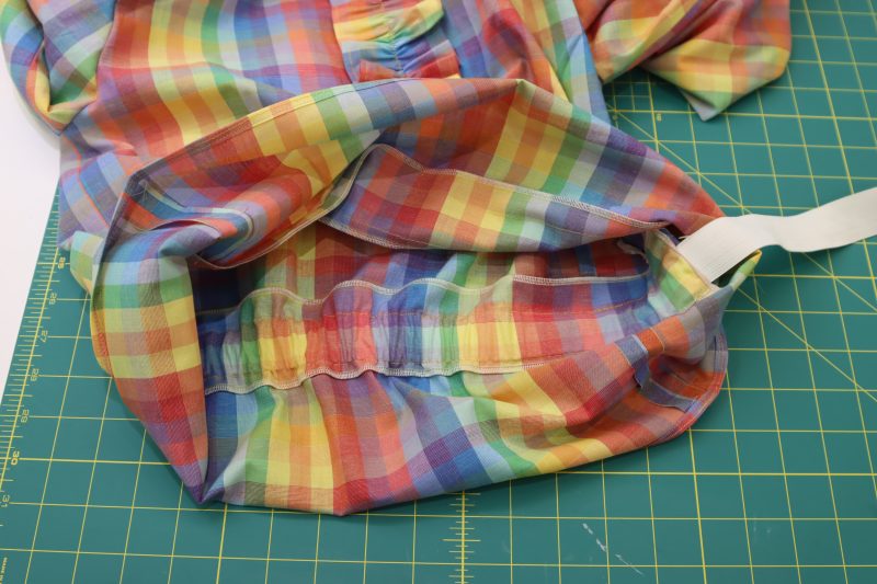 How To Insert Elastic Into Casing - White PJ Elastic - Mood Fabrics - Bayport Blouse Free Sewing Pattern Tutorial - MDF494 - Mood Fabrics Sewciety Blog - Feed the elastic through the casing with a safety pin.