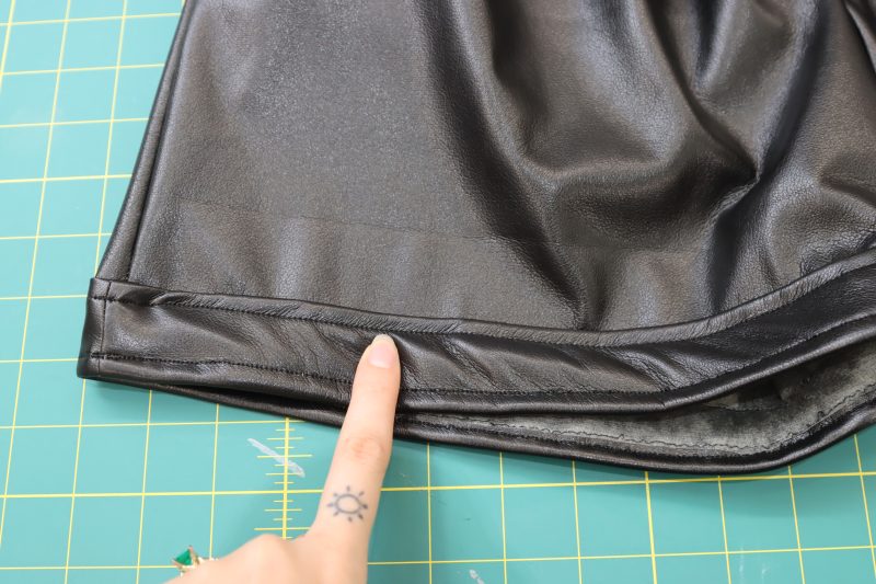 How To Topstitch Top Of Cuff - Buttery Faux Leather - Mood Fabrics - Dresden Shorts Free Sewing Pattern Tutorial - MDF493 - Mood Fabrics Sewciety Blog - Topstitch the top of the cuff to match the bottom.