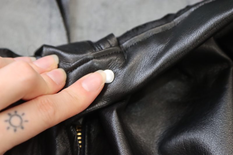 How To Insert Button Backing Into Hole - Gold Jeans Buttons - Mood Fabrics - Dresden Shorts Free Sewing Pattern Tutorial - MDF493 - Mood Fabrics Sewciety Blog - Poke the jeans button backing through the back of the hole.