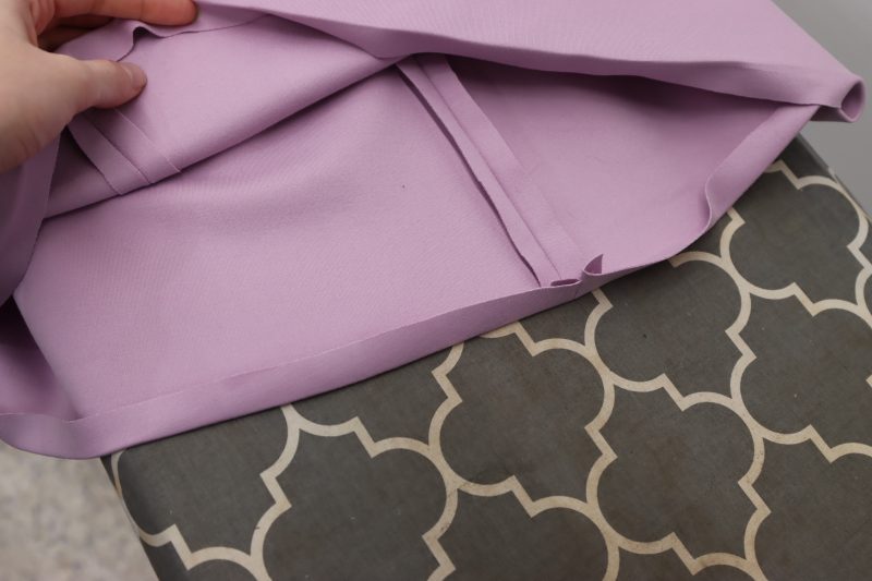 How To Iron Skirt Hem - Stretch Ponte Knit - Mood Fabrics - Camarillo Cardigan and Magdalene Midi Skirt Free Sewing Pattern Tutorial - MDF490 - Mood Fabrics Sewciety Blog - Iron ½ inch fold into bottom hem of the skirt.