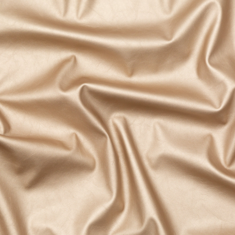 Italian Metallic Champagne Faux Leather Laminate over a Latte Stretch Faux Suede fabric perfect for Free Valentine's Day Sewing Projects such as the Jasper Jumpsuit Sewing Pattern free PDF download from Mood Fabrics Sewciety Blog.