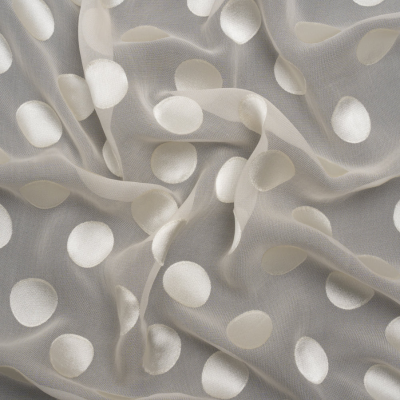 Famous Australian Designer Cream Burnout Satin Polka Dots Silk and Viscose Georgette fabric perfect for Free Valentine's Day Sewing Projects such as the Riverside Ruched Midi Dress Sewing Pattern free PDF download from Mood Fabrics Sewciety Blog.