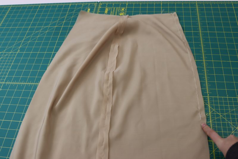 How To Pin Sew Lining Center Front Seam - Stretch Polyester Lining - Mood Fabrics - Peak Pencil Skirt Free Sewing Pattern Tutorial - MDF507 - Mood Fabrics Sewciety Blog - Pin and sew the center front seam.
