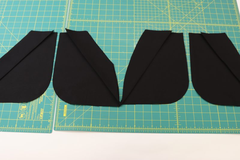 How To Place Pocket Facings On Front Pockets - Cotton Canvas - Mood Fabrics - Clarkston Carpenter Pants Free Sewing Pattern Tutorial - MDF503 - Mood Fabrics Sewciety Blog - Place the pocket facings on top of their respective front pockets.