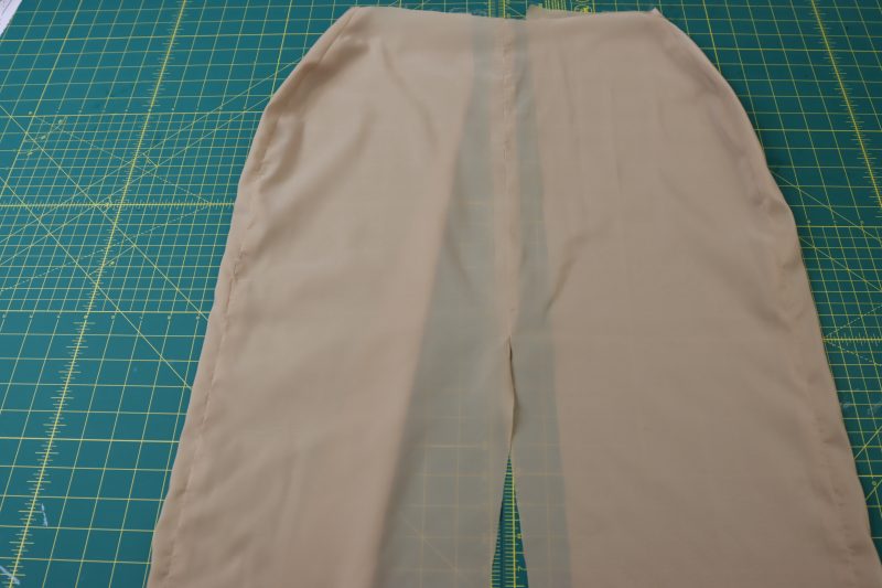 How To Press Lining Seams Open - Stretch Polyester Lining - Mood Fabrics - Peak Pencil Skirt Free Sewing Pattern Tutorial - MDF507 - Mood Fabrics Sewciety Blog - Open lining seams and press them flat.