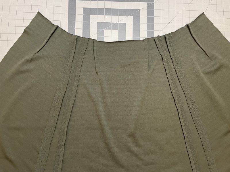 How To Pin Sew Back Panels - Stretch Liverpool Knit - Mood Fabrics - Marin Mini Skirt Free Sewing Pattern Tutorial - MDF499 - Mood Fabrics Sewciety Blog - Pin and sew the back skirt pieces to the front side panels.