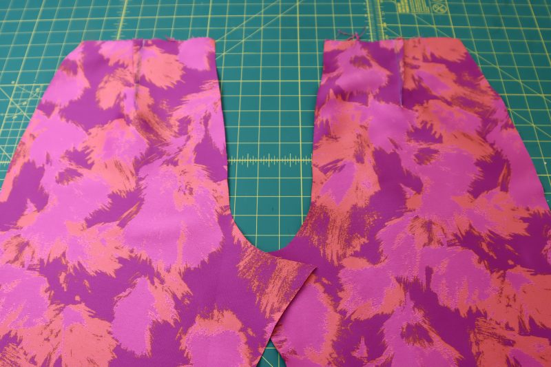 How To Press Back Darts - Luxury Polyester Brocade - Mood Fabrics - Chelsea Brocade Set Free Sewing Pattern Tutorial - MDF508 - Mood Fabrics Sewciety Blog - Press the back darts toward the side seam.