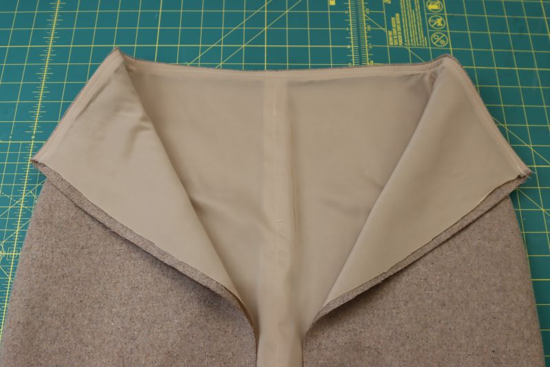 How To Flip Skirt Right Sides Out - Brushed Wool Twill - Mood Fabrics - Peak Pencil Skirt Free Sewing Pattern Tutorial - MDF507 - Mood Fabrics Sewciety Blog - Flip the skirt right sides out.
