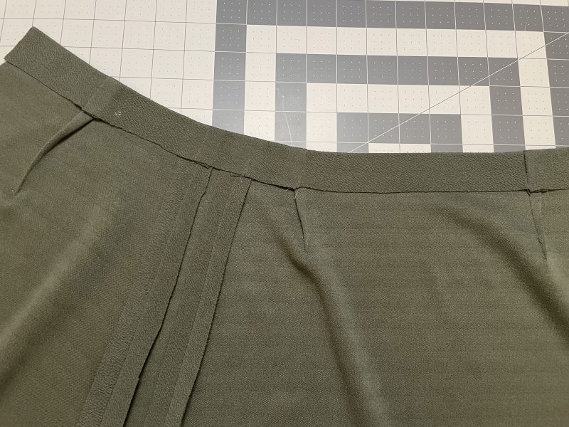 How To Iron Hem Tape Into Waistband - Stretch Liverpool Knit - Mood Fabrics - Marin Mini Skirt Free Sewing Pattern Tutorial - MDF499 - Mood Fabrics Sewciety Blog - Iron hem tape into the waistband.