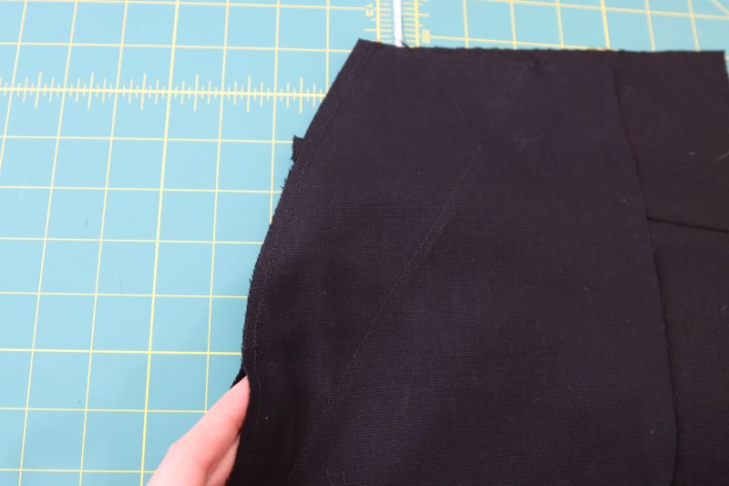 How To Sew Pocket B To Back Pants - Cotton Canvas - Mood Fabrics - Clarkston Carpenter Pants Free Sewing Pattern Tutorial - MDF503 - Mood Fabrics Sewciety Blog - Sew the B pockets to the back pants pieces.