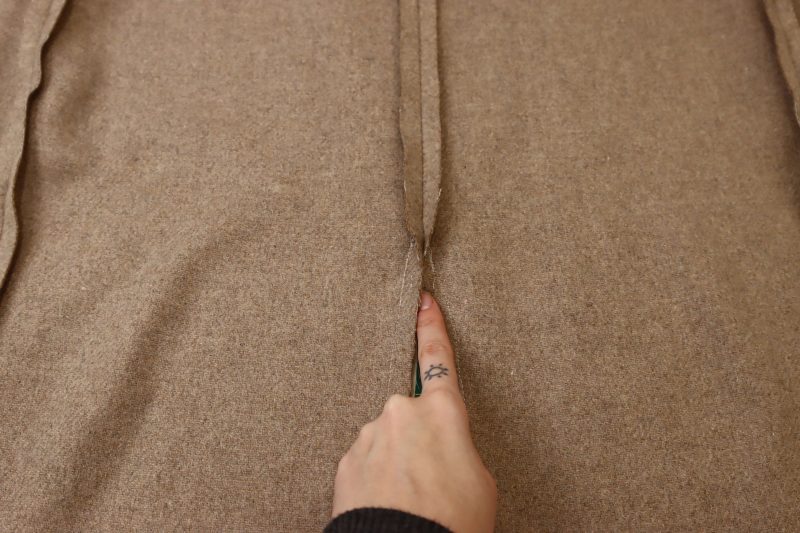 How To Sew Both Sides Of Slit - Brushed Wool Twill - Mood Fabrics - Peak Pencil Skirt Free Sewing Pattern Tutorial - MDF507 - Mood Fabrics Sewciety Blog - Sew the two sides of the slit so that the seams meet at a point at the top of the slit.