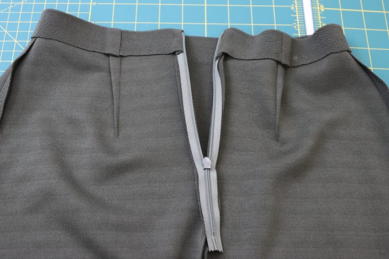 How To Sew Invisible Zipper At Center Back - Invisible Zipper - Mood Fabrics - Marin Mini Skirt Free Sewing Pattern Tutorial - MDF499 - Mood Fabrics Sewciety Blog - Sew the invisible zipper into the center back seam.