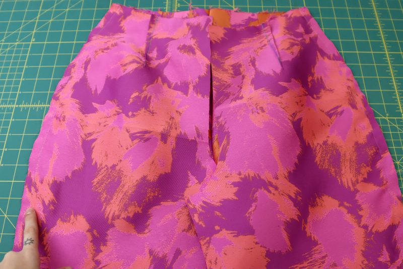 How To Sew Side Seams - Luxury Polyester Brocade - Mood Fabrics - Chelsea Brocade Set Free Sewing Pattern Tutorial - MDF508 - Mood Fabrics Sewciety Blog - Sew the front and back pants pieces together at the side seams.