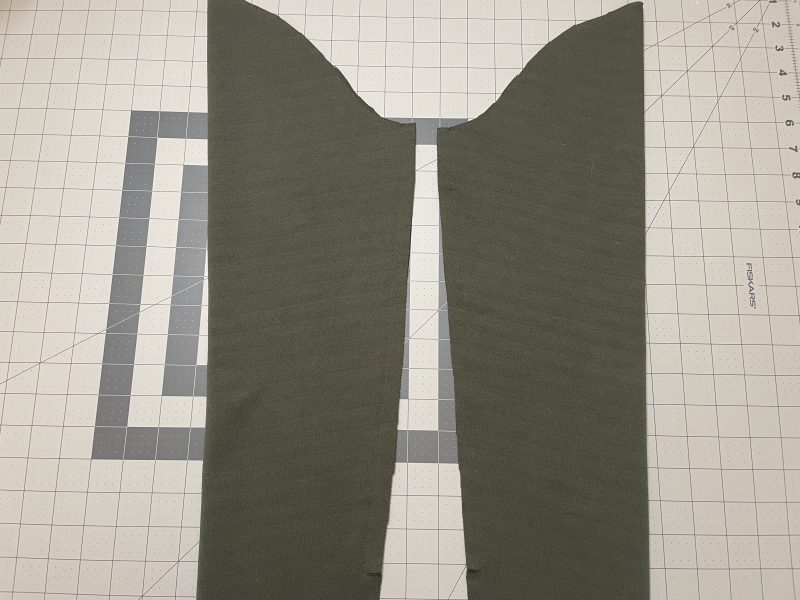 How To Sew Sleeve Inseams - Stretch Liverpool Knit - Mood Fabrics - Cove Collared Wrap Top Free Sewing Pattern Tutorial - MDF498 - Mood Fabrics Sewciety Blog - Sew the sleeves right sides together down to the notch.