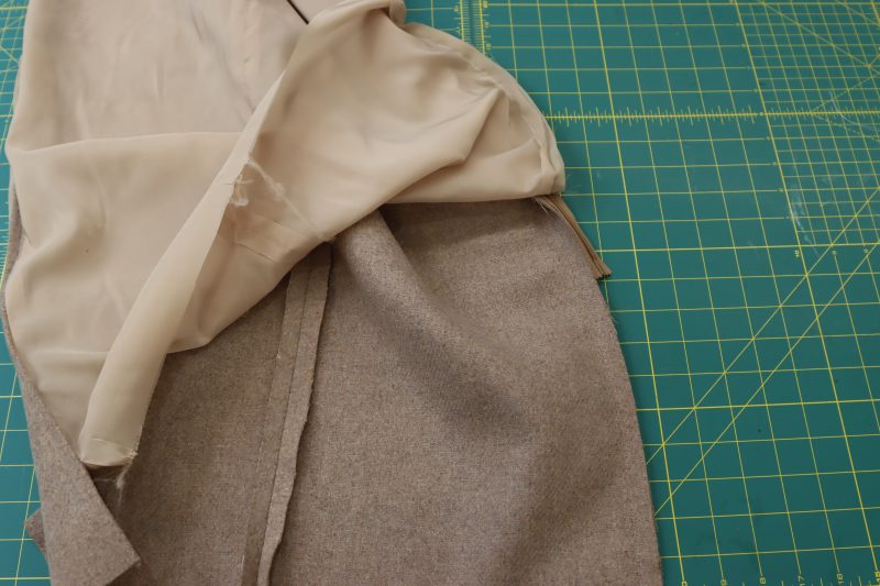 How To Sew Center Back Seam Under Zipper - Brushed Wool Twill - Mood Fabrics - Peak Pencil Skirt Free Sewing Pattern Tutorial - MDF507 - Mood Fabrics Sewciety Blog - Sew the center back seam under the zipper on both the shell and the lining.