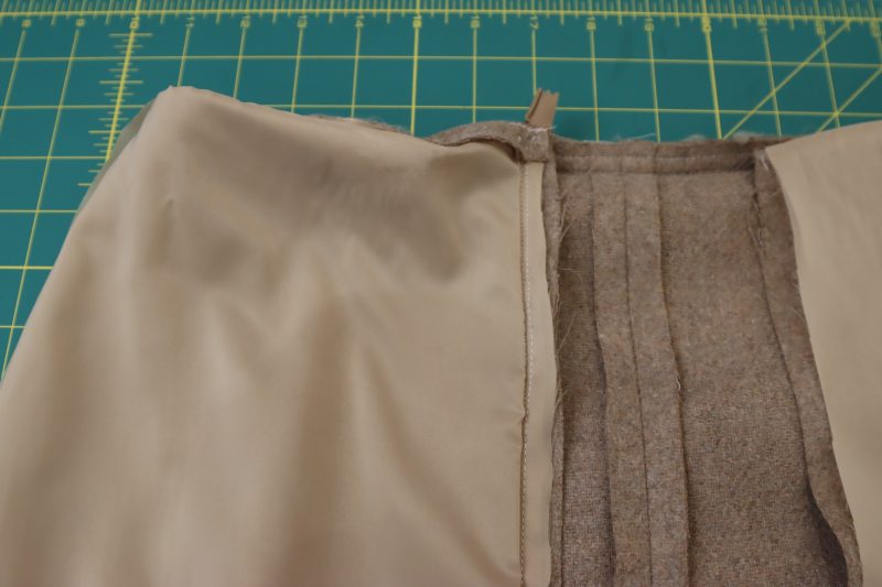 How To Sew Zipper Between Shell And Lining - Invisible Zipper - Mood Fabrics - Peak Pencil Skirt Free Sewing Pattern Tutorial - MDF507 - Mood Fabrics Sewciety Blog - Sew the zipper between the shell and the lining while they are right sides together.