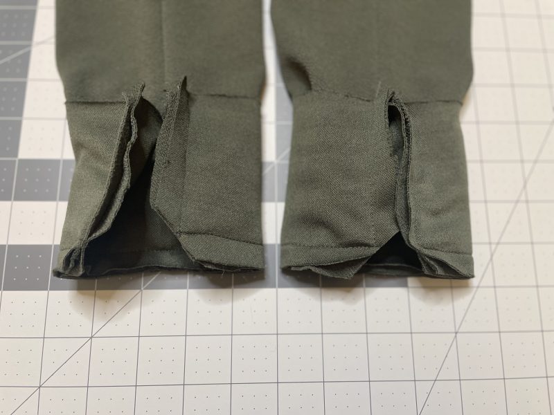 How To Clip Cuff Corners - Stretch Liverpool Knit - Mood Fabrics - Cove Collared Wrap Top Free Sewing Pattern Tutorial - MDF498 - Mood Fabrics Sewciety Blog - Clip the corners of the cuffs to make it easier to flip right sides out.