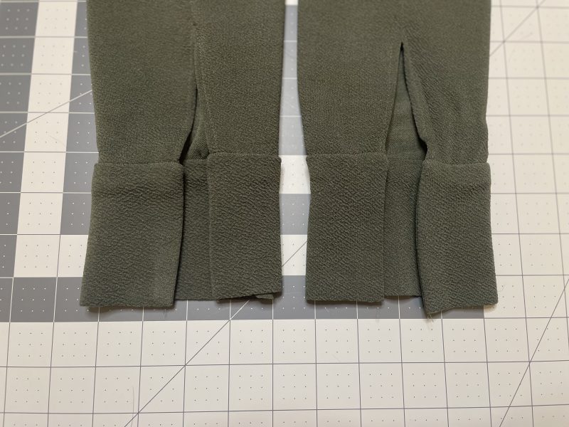 How To Flip Cuffs Right Sides Out - Stretch Liverpool Knit - Mood Fabrics - Cove Collared Wrap Top Free Sewing Pattern Tutorial - MDF498 - Mood Fabrics Sewciety Blog - Flip the cuffs right sides out.