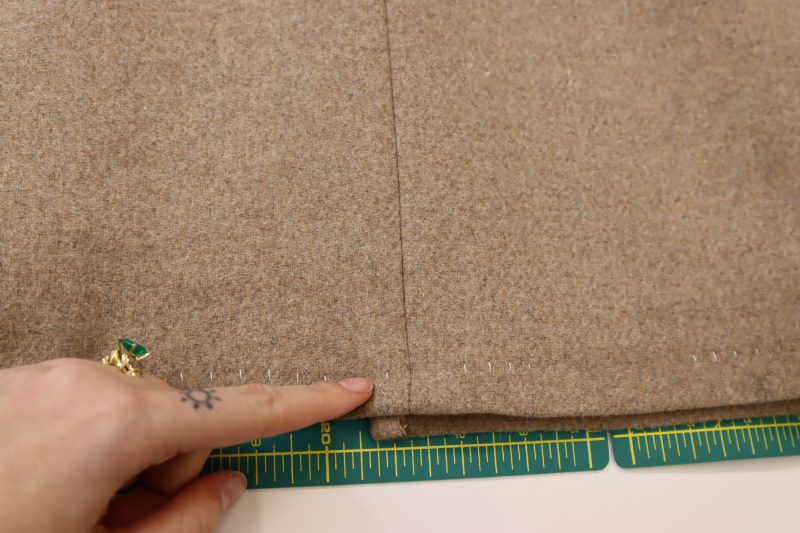 How To Sew Blind Hem On Shell - Gutermann Sew All Thread - Mood Fabrics - Peak Pencil Skirt Free Sewing Pattern Tutorial - MDF507 - Mood Fabrics Sewciety Blog - Sew a blind hem on the outer skirt.