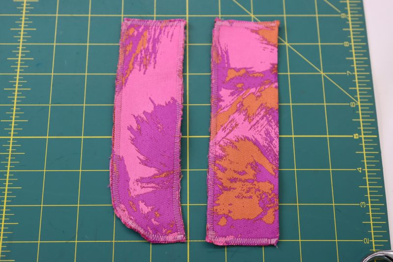 How To Sew Fly Pieces With Zigzag - Luxury Polyester Brocade - Mood Fabrics - Chelsea Brocade Set Free Sewing Pattern Tutorial - MDF508 - Mood Fabrics Sewciety Blog - Zigzag around the raw edges of the fly pieces.