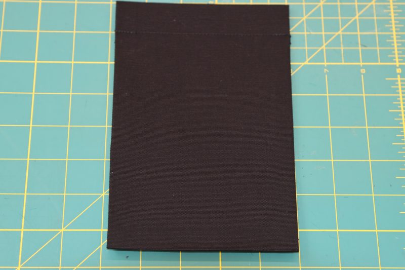 How To Topstitch Side Pocket Top - Cotton Canvas - Mood Fabrics - Clarkston Carpenter Pants Free Sewing Pattern Tutorial - MDF503 - Mood Fabrics Sewciety Blog - Topstitch the top edge of the side pocket.