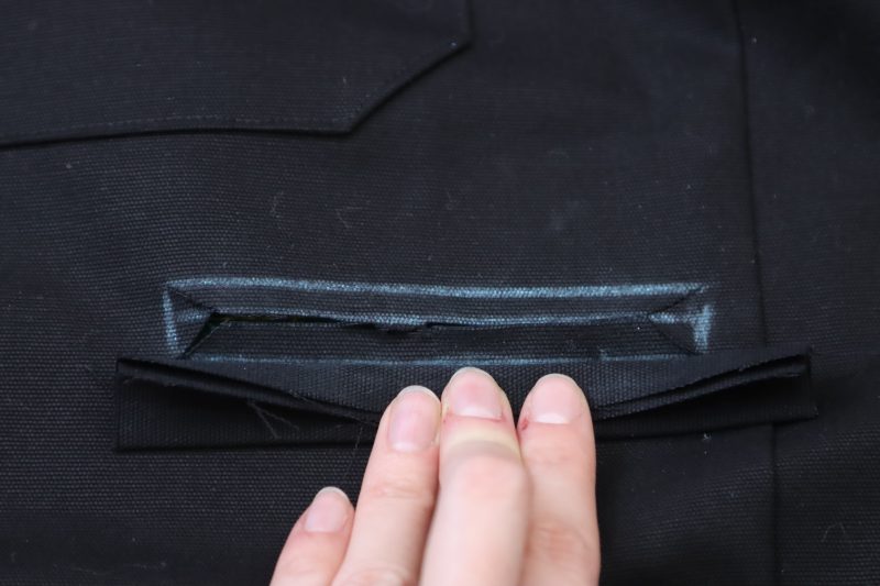How To Clip Welt Opening - Cotton Canvas - Mood Fabrics - Clarkston Carpenter Pants Free Sewing Pattern Tutorial - MDF503 - Mood Fabrics Sewciety Blog - Clip along the chalk lines as shown in the photo.