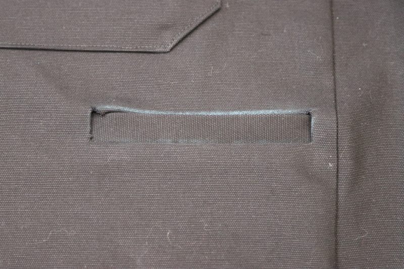 How To Flip Welt To Wrong Side - Cotton Canvas - Mood Fabrics - Clarkston Carpenter Pants Free Sewing Pattern Tutorial - MDF503 - Mood Fabrics Sewciety Blog - Flip the welt towards the wrong side of the fabric and press.