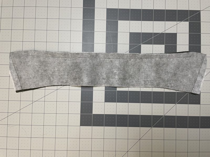 How To Sew Collar Right Sides Together - Stretch Liverpool Knit - Mood Fabrics - Cove Collared Wrap Top Free Sewing Pattern Tutorial - MDF498 - Mood Fabrics Sewciety Blog - Sew the collar pieces right sides together, leaving the bottom edge open.